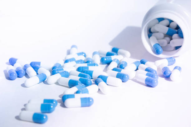 istock Tablets on a plate. Medicine for the patient on a spoon. Tablet on a spoon. 1310835877
