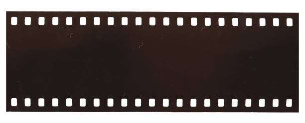 istock Dusty and grungy 35mm film texture material or surface 1310836703