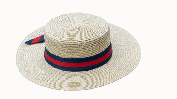 istock Beautiful hat with ribbon and bow on a beach hat, white background from side view. 1310840306