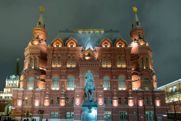 Moscow, Russia - January 17, 2021; Moscow. Red Square Night Russia Winter. People enter through the entrance gate of Red Square.