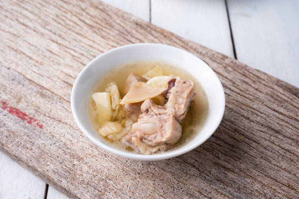 istock Pickled lettuce soup with spare ribs pork bone soup bowl with vegetable 1310846097