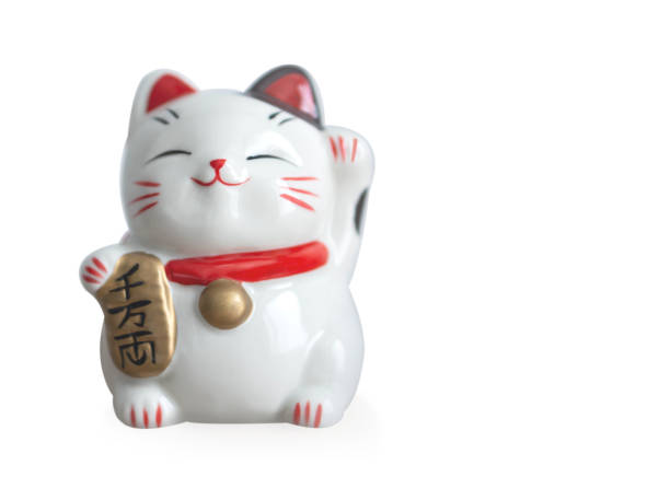 istock Maneki neko lucky cat show text on hand meaning rich on white background, select focus 1310846342