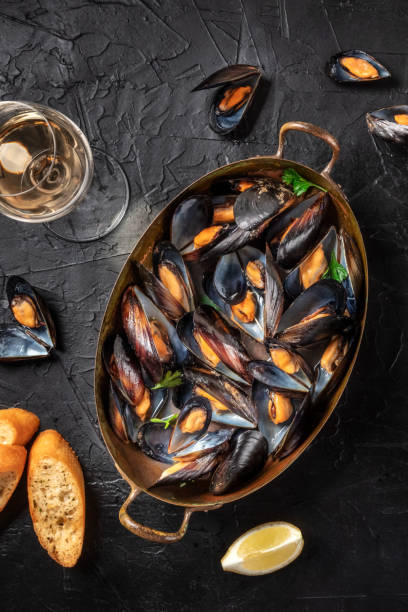 istock Dinner with mussels and wine, top shot 1310852387
