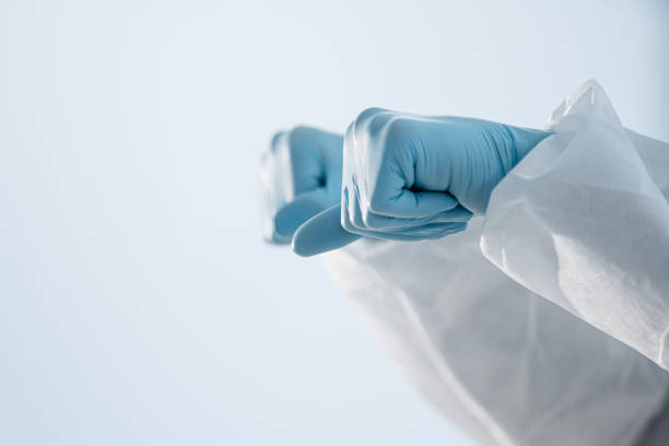 istock background image blue protective gloves on the hands of a medic 1310854761