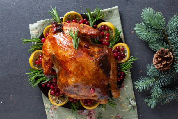 Baked Christmas chicken on a table stock photo
