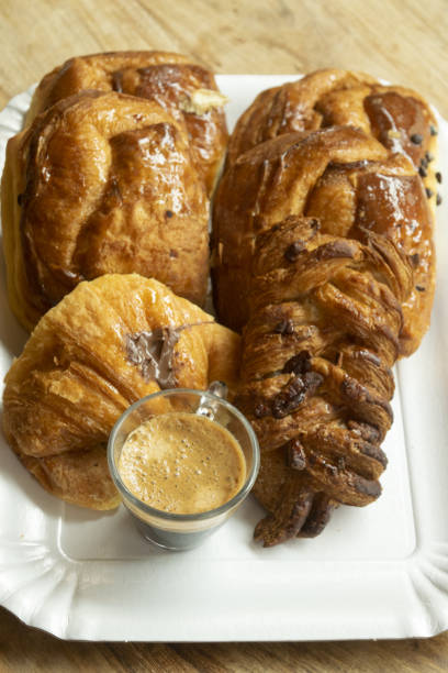 istock espresso coffee and chocolate croissants 1310859173