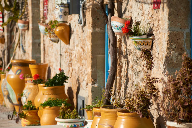 istock ornamental vases on a stone wall 1310863409