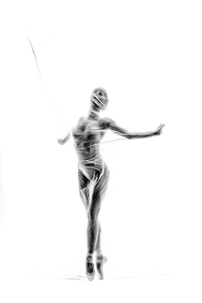 istock Graceful ballerina dancing with transparent nylon 1310870264