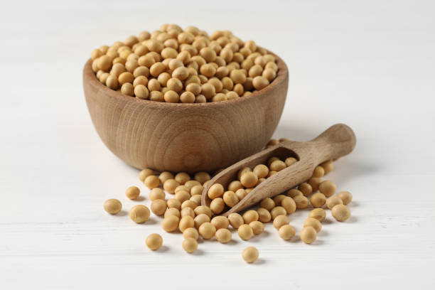 istock Bowl and scoop with soy on white table 1310871529