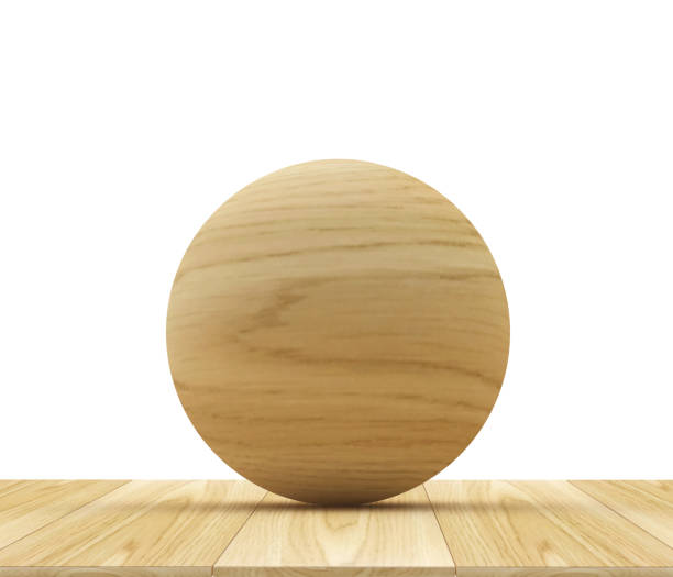 istock Wooden sphere on a wooden 1310872930