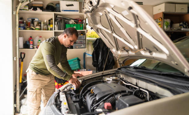 istock Pouring coolant in car. 1310875590