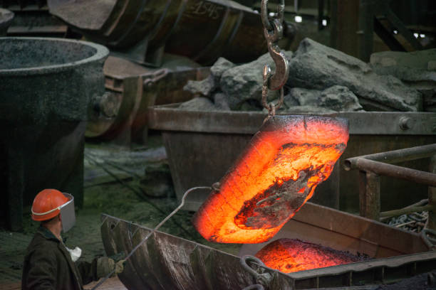 istock Steelworker at work at a steel mill 1310875700