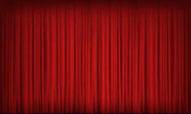 istock Red velvet curtain in a theater or cinema. 1310879663