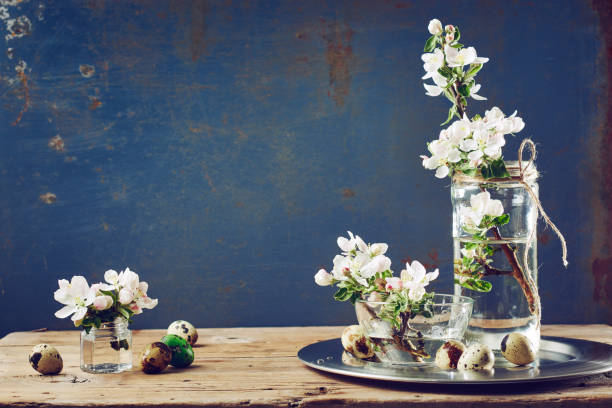 istock Apple blossom flowers and quail eggs. 1310883199