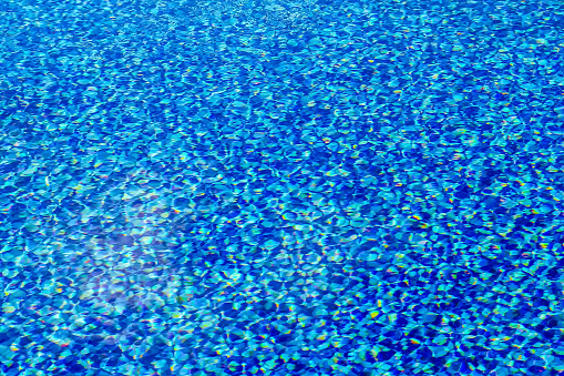 Close-up of swimming pool tiled bottom