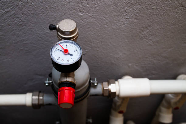 istock Monometer for determining the water pressure in the heating system. Boiler heating system equipment. Emergency pressure relief valve. 1310887103