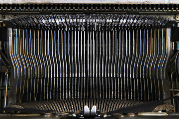 istock detail of typing machine 1310888345