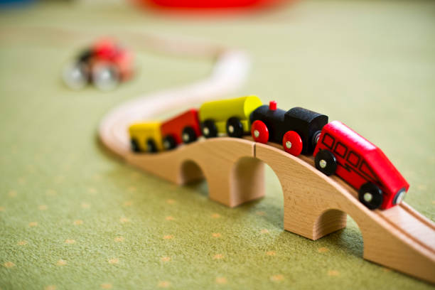 istock Wooden train toy on a bridge 1310891034