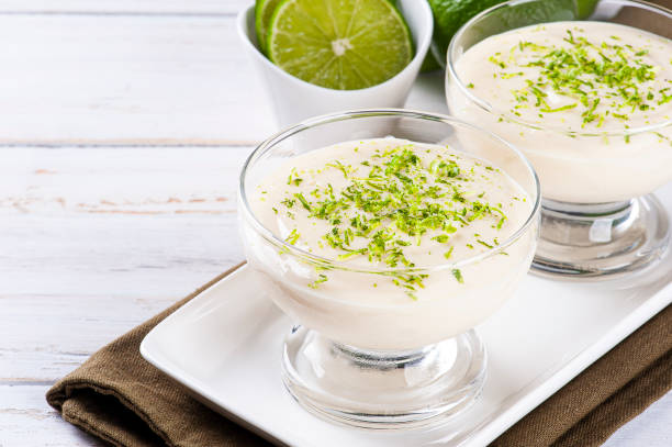 Delicious lemon mousse. Refreshing and tasty dessert - Lime mousse Delicious lemon mousse. Refreshing and tasty dessert - Lime mousse. Copy space mousse dessert stock pictures, royalty-free photos & images