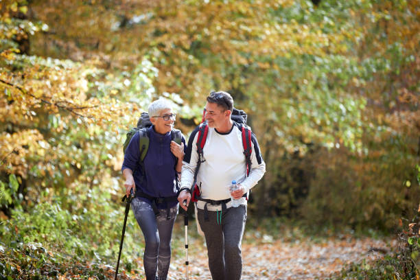istock Elder couple hiking in forest 1310894762