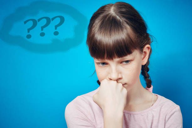 istock sad pensive thoughtful girl looking down. emotion and facial expression 1310895535