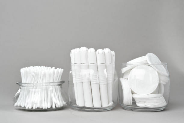 istock Cotton tampons and ear buds on paper background 1310895540