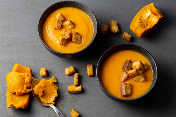 istock Pumpkin soup served with croutons 1310896434