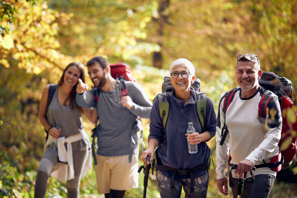 istock Group of people hiking in nature 1310898542