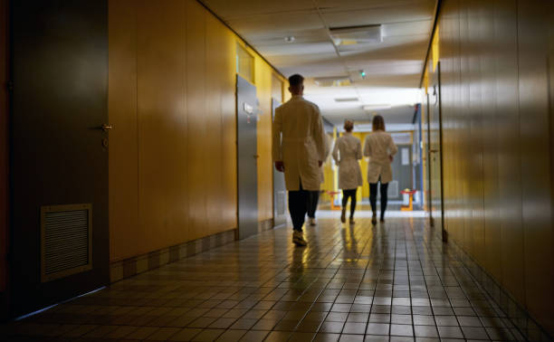 istock A university hallway with students on a break. Institution, hallway, university, people 1310901999