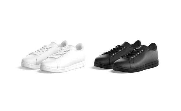 istock Blank black and white leather sneakers with lace mockup, isolated 1310903460