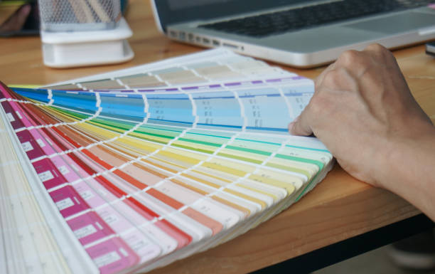 istock Graphic designer working on digital tablet. artist drawing on graphic tablet and Color swatch samples. Artist Creative Designer sketch graphic drawing creative creativity draw studying work on tablet 1310904172