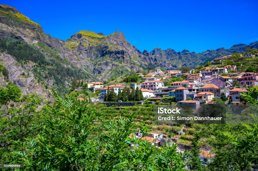 View of Curral das Freiras village in the Nuns Valley in beautiful mountain scenery, municipality of Câmara de Lobos, Madeira island, Portugal. Nun Stock Photo