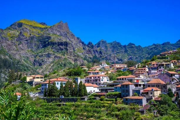 View of Curral das Freiras village in the Nuns Valley in beautiful mountain scenery, municipality of Câmara de Lobos, Madeira island, Portugal.