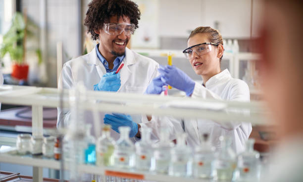 istock Two young medical students conducting chemical experiment 1310905164