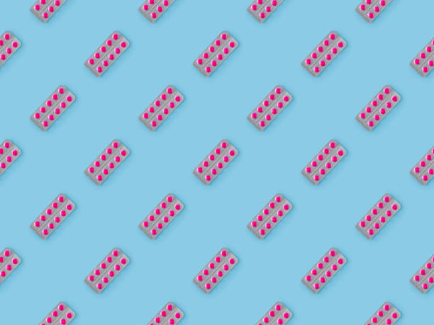 istock Seamless repetitive Pill blister Pack on blue background 1310905254