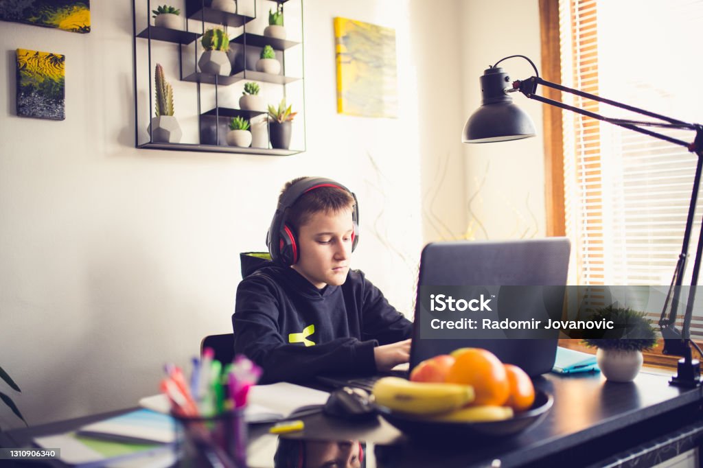 Learning Computer At Home Students Learning Via Computer At Home Stock Photo - Download Image Now ...