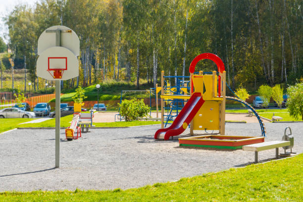 istock empty kids play ground in yard at early morning 1310906638