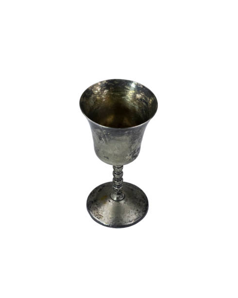 istock Ancient chalice made of silver on white background 1310906827