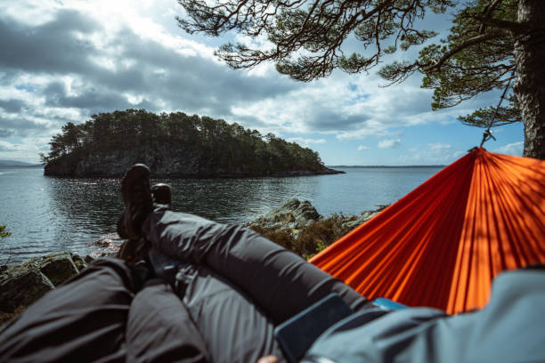 istock Springtime in Norway: adventures in nature outdoor on hammock 1310906996