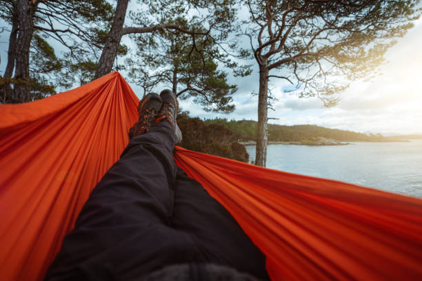 istock Springtime in Norway: adventures in nature outdoor on hammock 1310907004