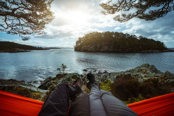 istock Springtime in Norway: adventures in nature outdoor on hammock 1310907045