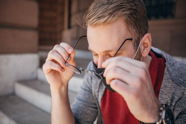 istock Man sitting on steps outdoors 1310908587