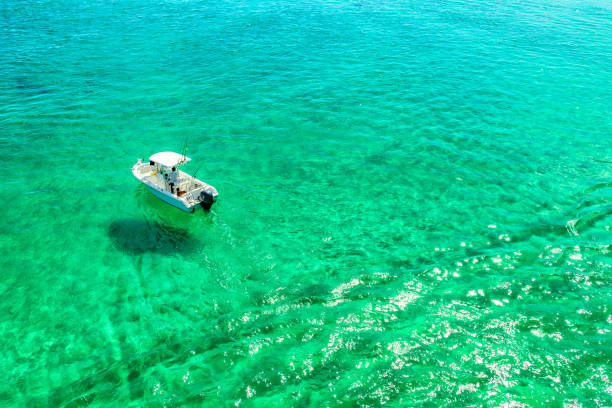 istock Fishing Boat In a Shallow Bay 1310910551