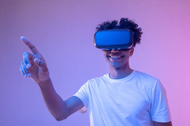 istock African american young guy in vr glasses enjoying the game 1310911342