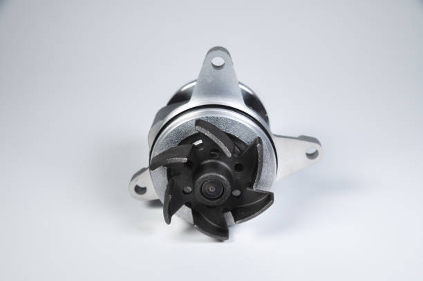 istock New internal combustion engine cooling water pump on a gray background. Contrast light 1310911351
