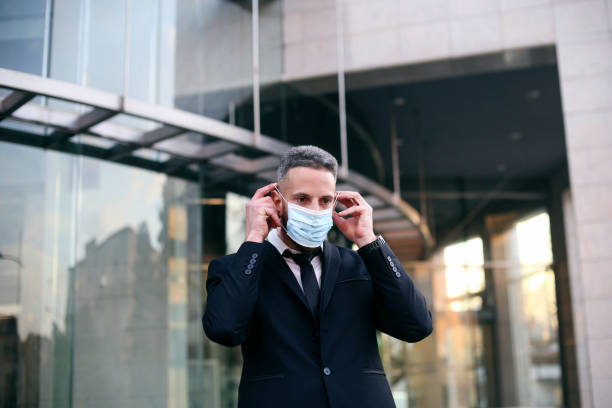 istock Businessman wearing a mask 1310912045