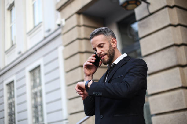 istock Businessman talking on phone 1310912107