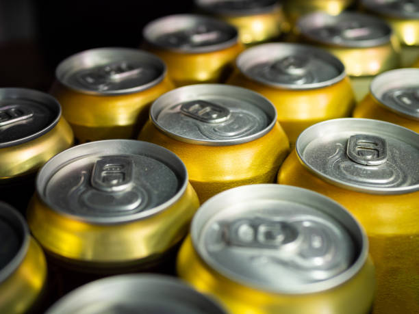 istock aluminum cans of soda background. 1310912395