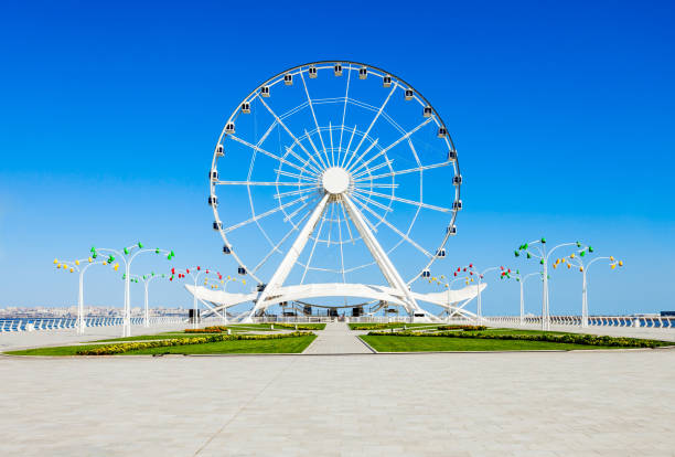 Baku Ferris Wheel, Azerbaijan Baku Ferris Wheel also known as the Baku Eye is a Ferris wheel on Baku Boulevard in the Seaside National Park of Baku, Azerbaijan ferris wheel stock pictures, royalty-free photos & images