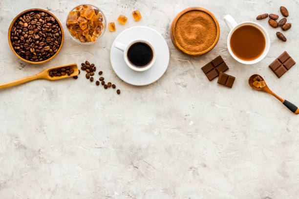 istock Coffee and cocoa beans and ground powder with hot chocolate drink 1310915961